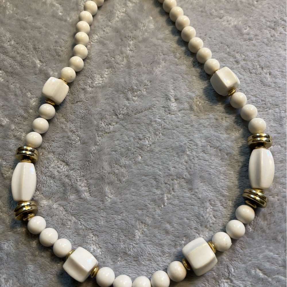 Gold and White Necklace with Elegant Bead Design